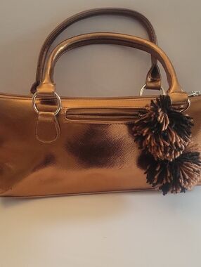 Metallic Bronze Tote Handbag with Pom Pom Accent
